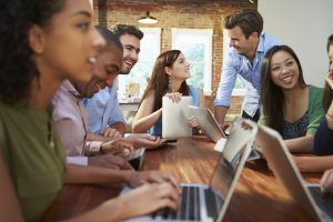 Businessmen And Businesswomen Meeting To Discuss Ideas